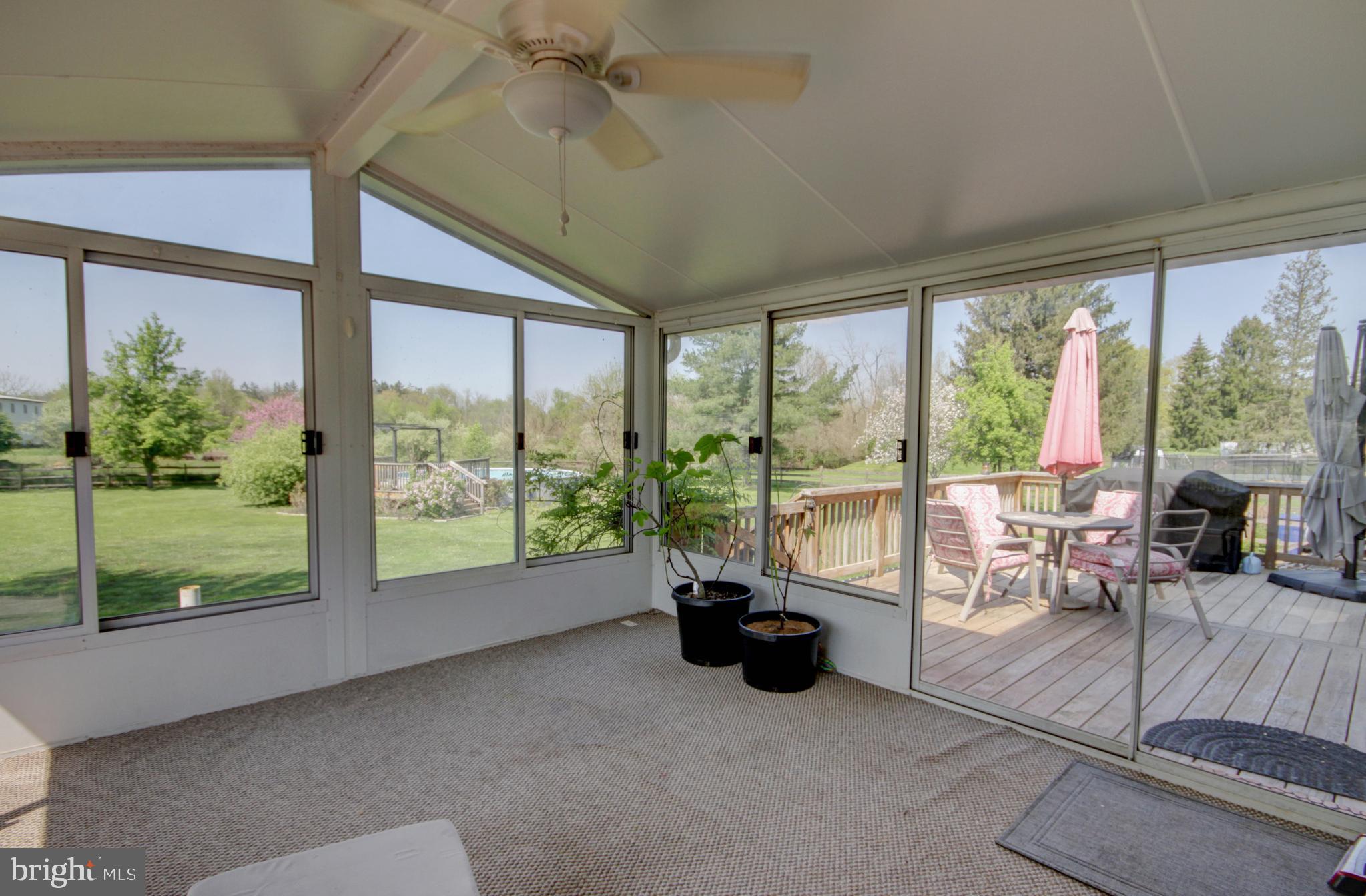 215 Hoffecker Road Phoenixville, PA 19460 - Photo 24 of 49 a living room with furniture and floor to ceiling windows