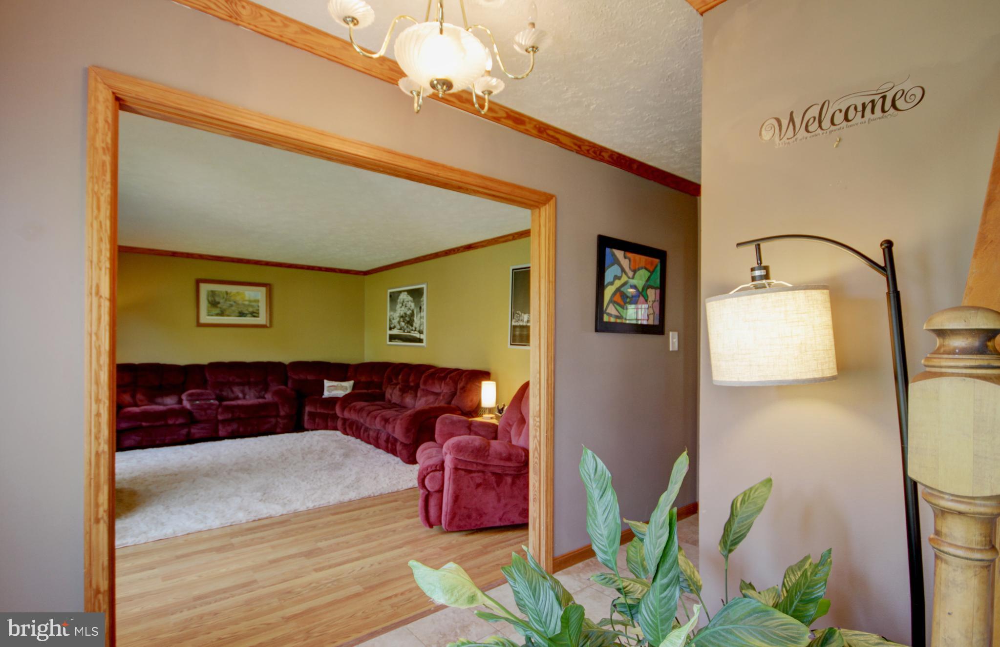 215 Hoffecker Road Phoenixville, PA 19460 - Photo 4 of 49 a bedroom with a bed and a dresser