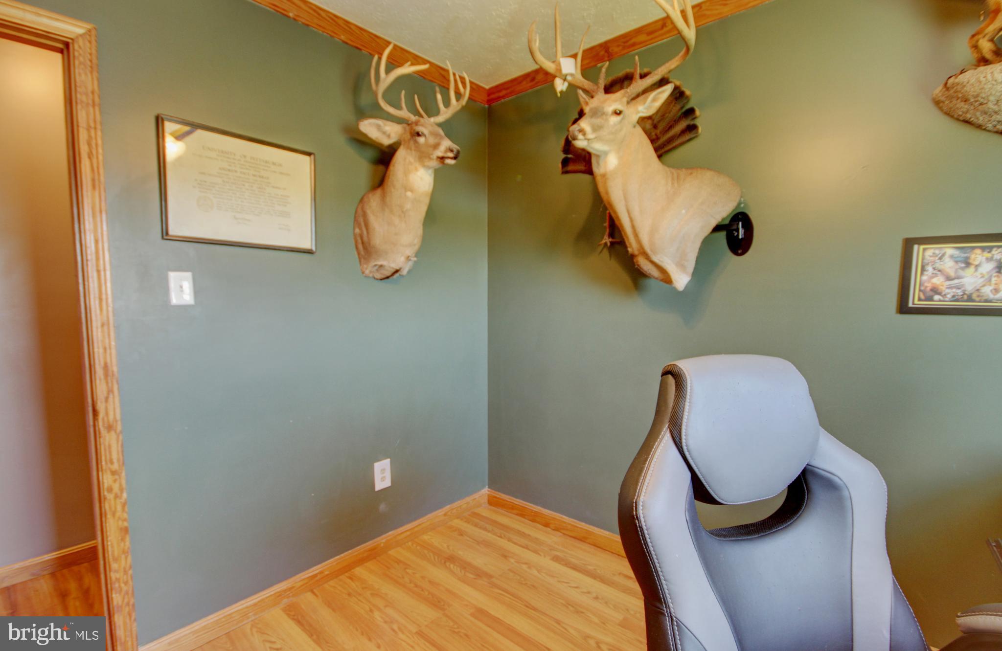215 Hoffecker Road Phoenixville, PA 19460 - Photo 41 of 49 a bedroom with a bed and a chair