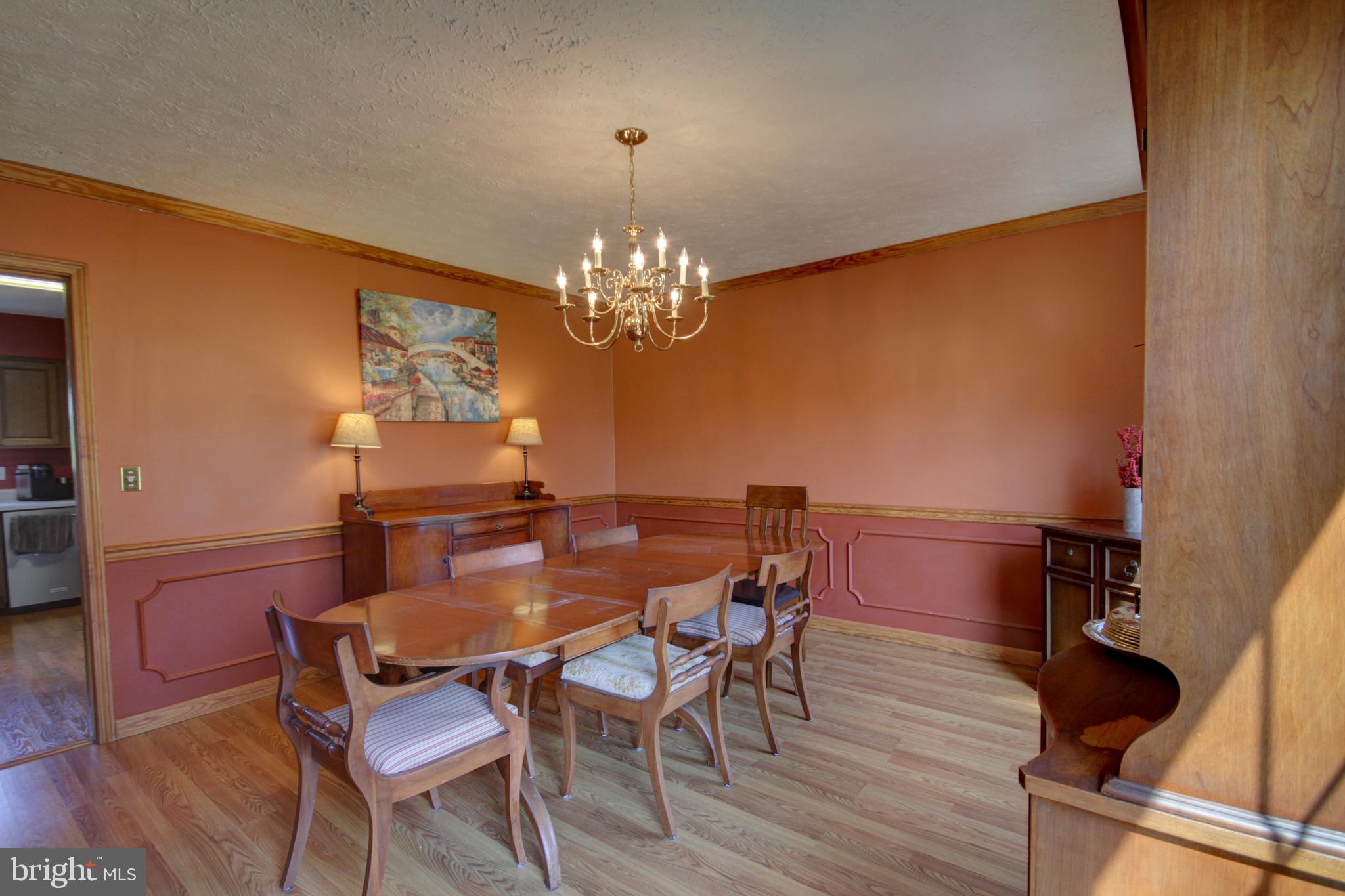 215 Hoffecker Road Phoenixville, PA 19460 - Photo 9 of 49 a view of a dining room with furniture and chandelier