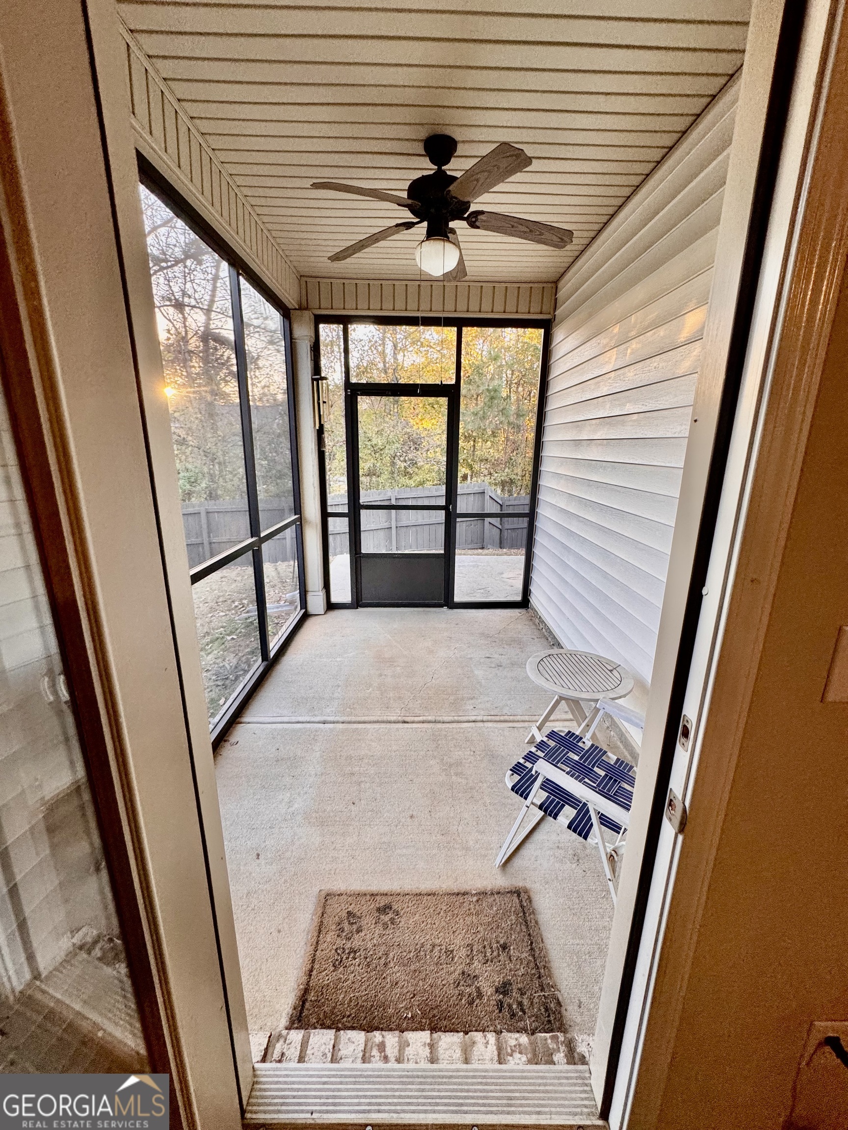 52 Pulaski Avenue Hampton, GA 30228 - Photo 30 of 32 a view of a hallway with a window