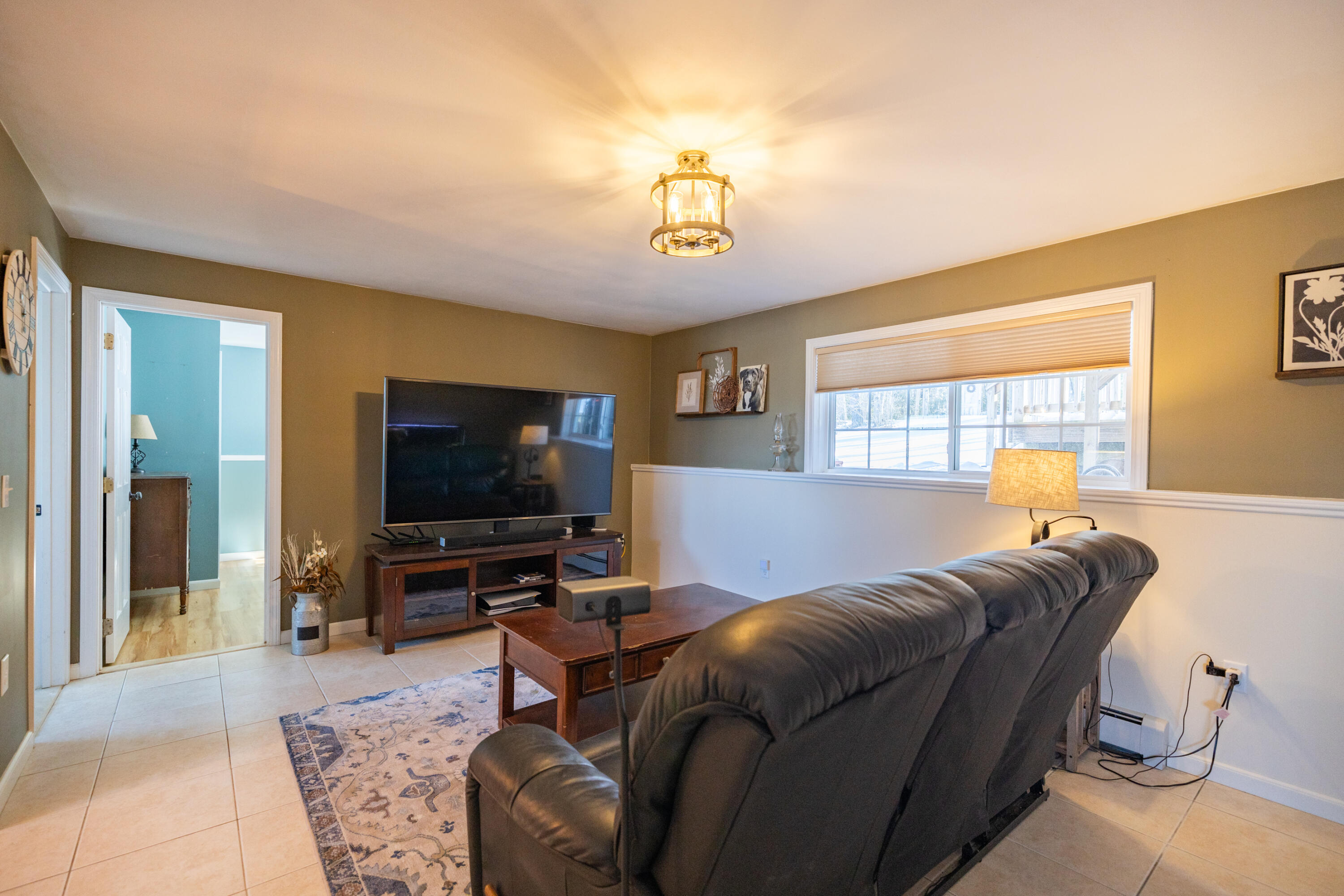 1335 Lewiston Road New Gloucester, ME 04260 - Photo 30 of 39 family room down