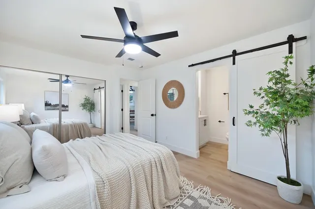 swimming pool view with a lake view