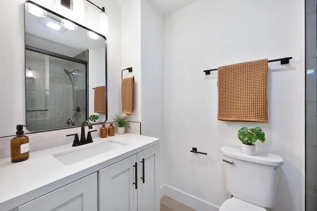 a view of an empty room with a staircase