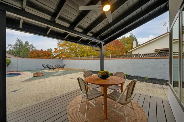 a view of a swimming pool with a lounge chairs