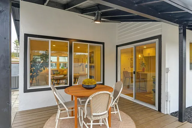a view of swimming pool with seating space