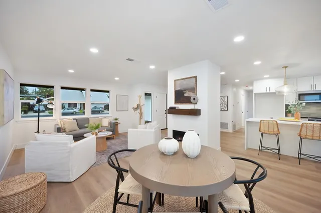 a view of a livingroom with furniture and a livingroom