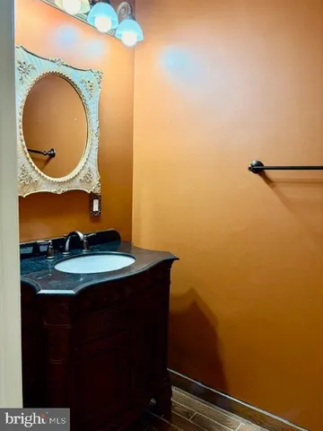 a bathroom with a toilet and a sink