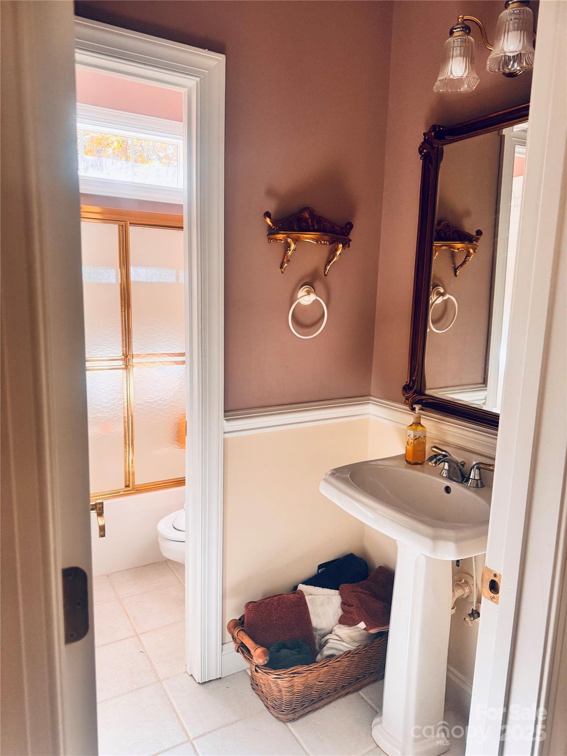 12350 Hartwood Road Midland, NC 28107 - Photo 17 of 25 a bathroom with a sink and a mirror
