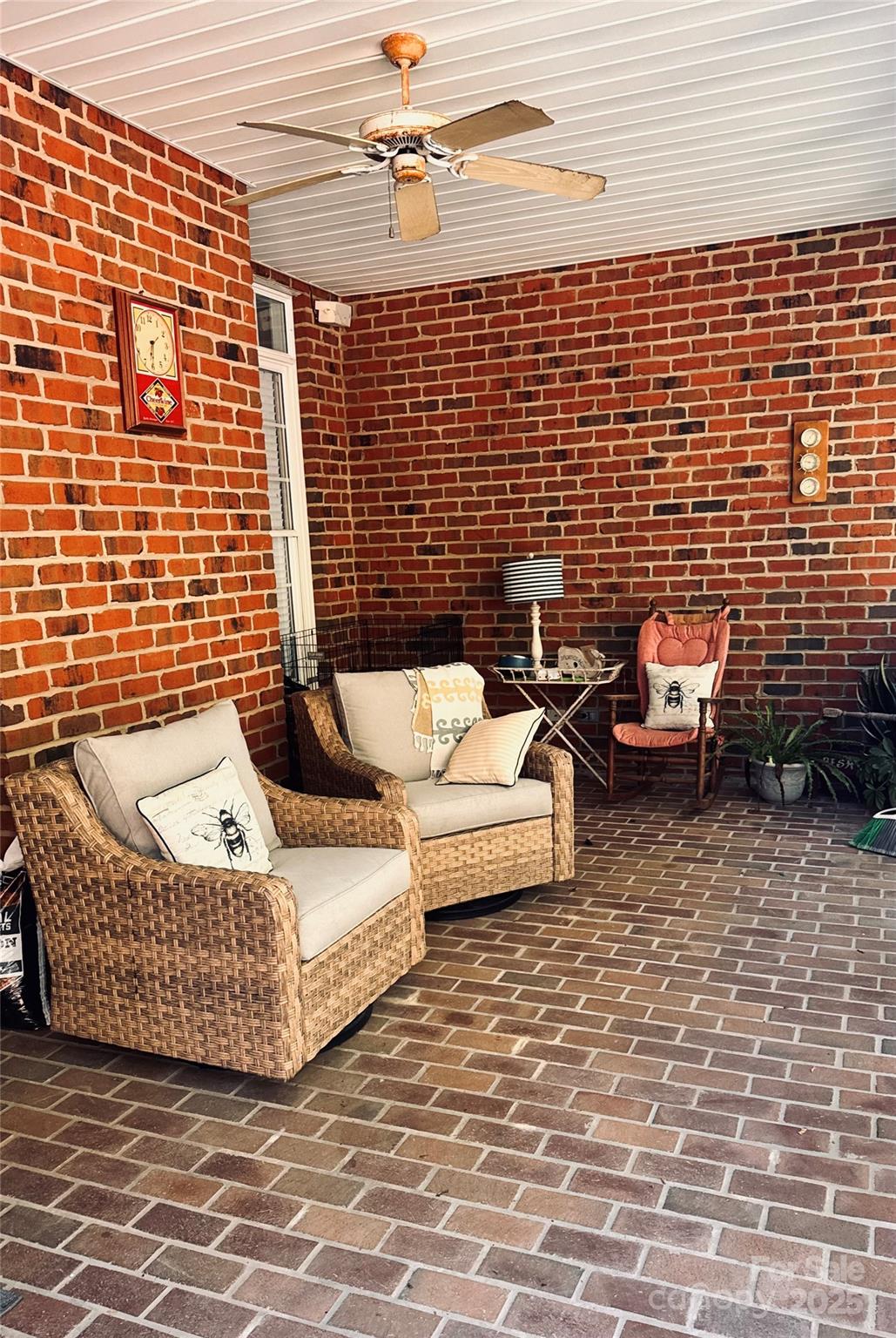 12350 Hartwood Road Midland, NC 28107 - Photo 21 of 25 a view of a patio with couches chairs and wooden floor