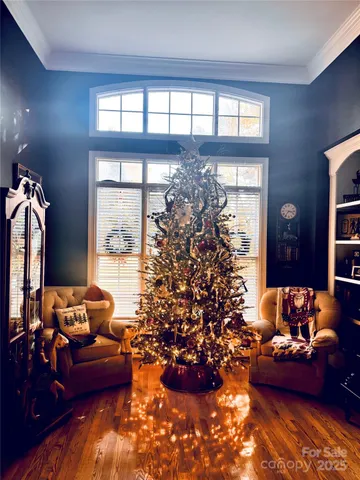 a view of living room with furniture and window