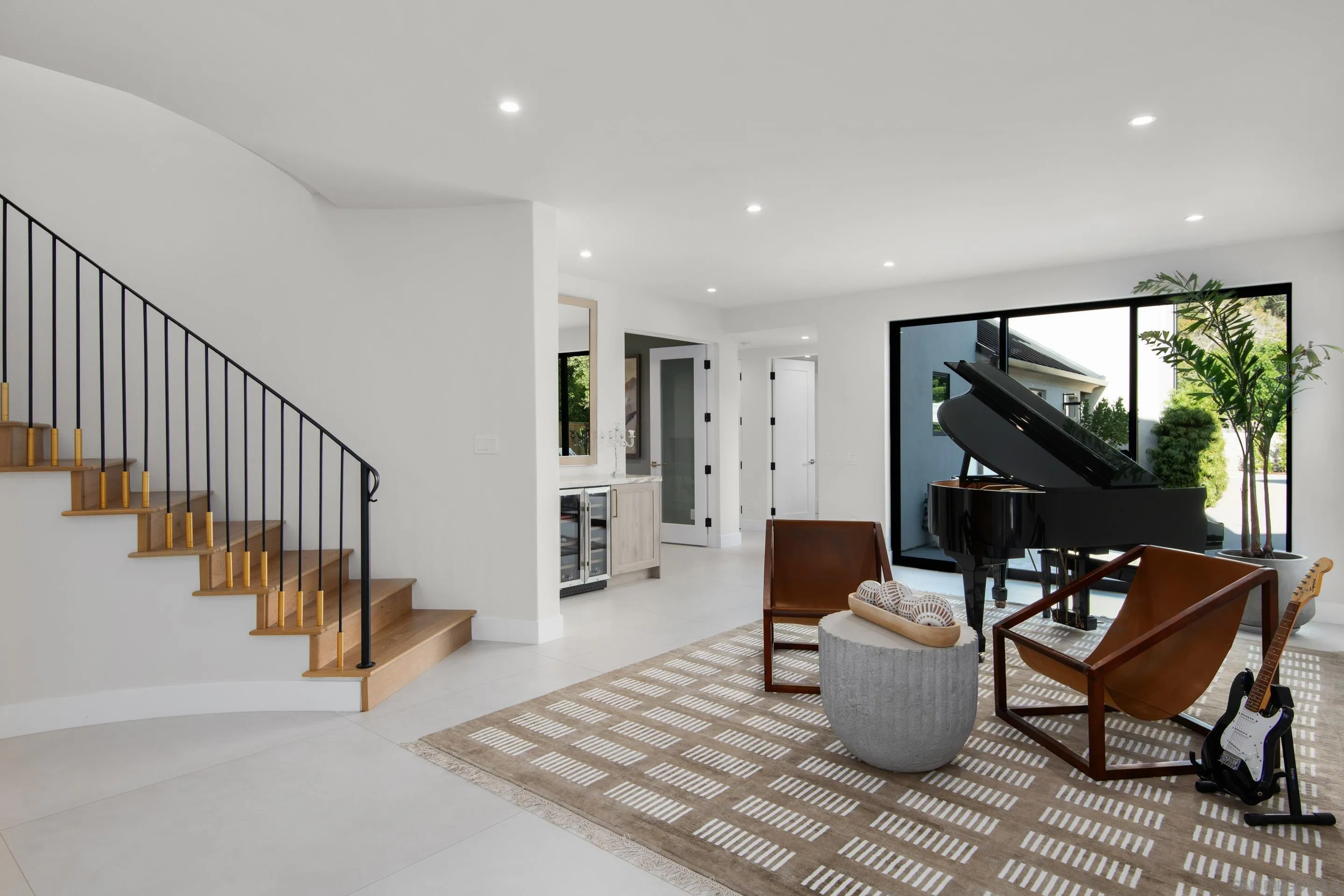 6665 Via Estrada La Jolla, CA 92037 - Photo 18 of 59 a living room with furniture a rug and a window