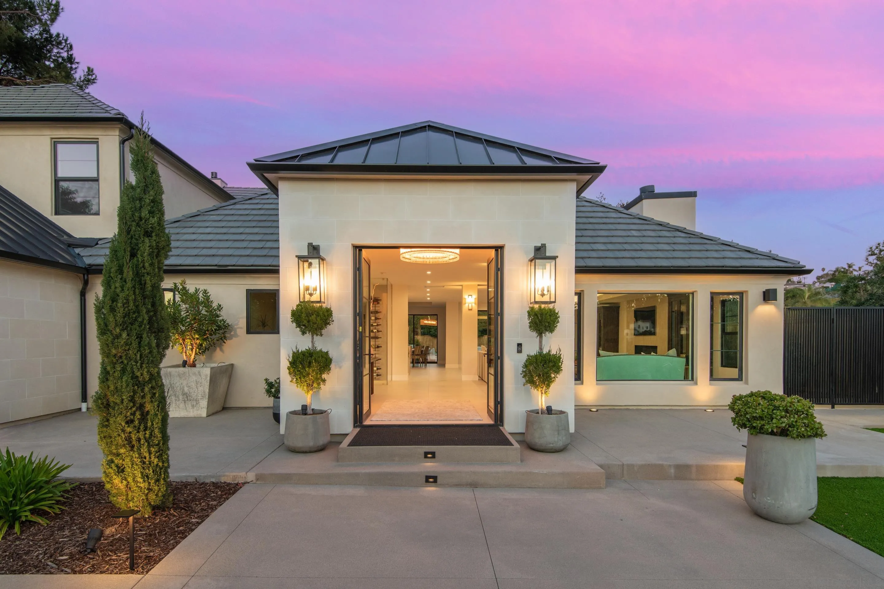 6665 Via Estrada La Jolla, CA 92037 - Photo 2 of 59 a front view of a house with garden