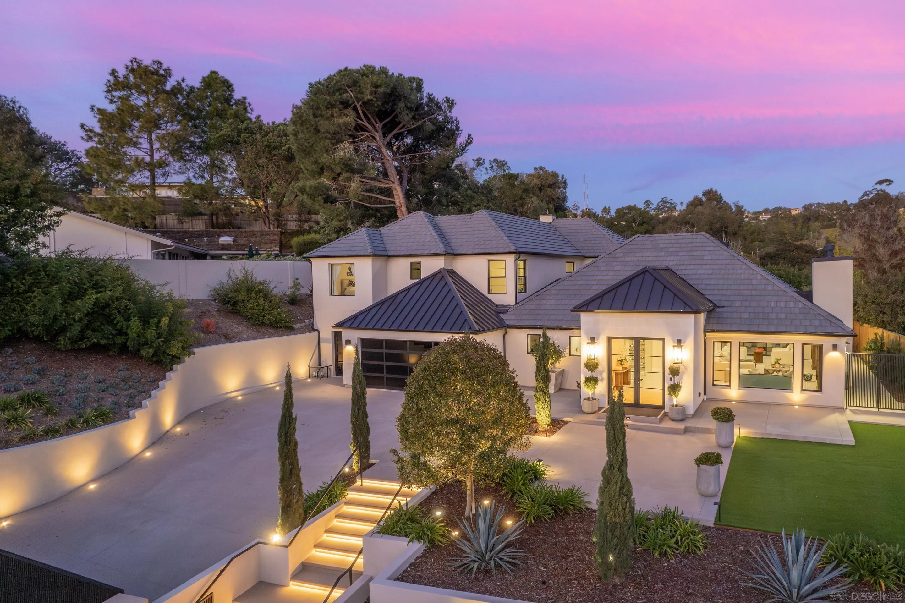 6665 Via Estrada La Jolla, CA 92037 - Photo 27 of 59 a front view of a house with a yard