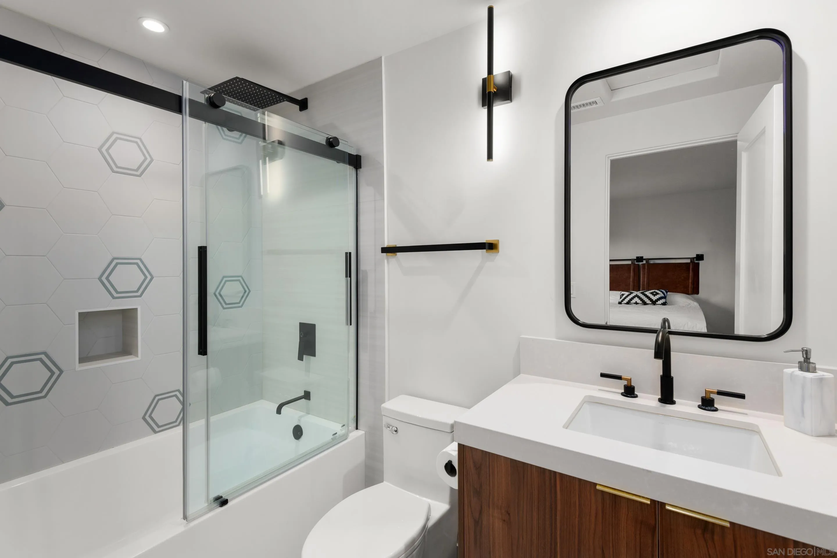 6665 Via Estrada La Jolla, CA 92037 - Photo 35 of 59 a bathroom with a sink toilet tub and shower