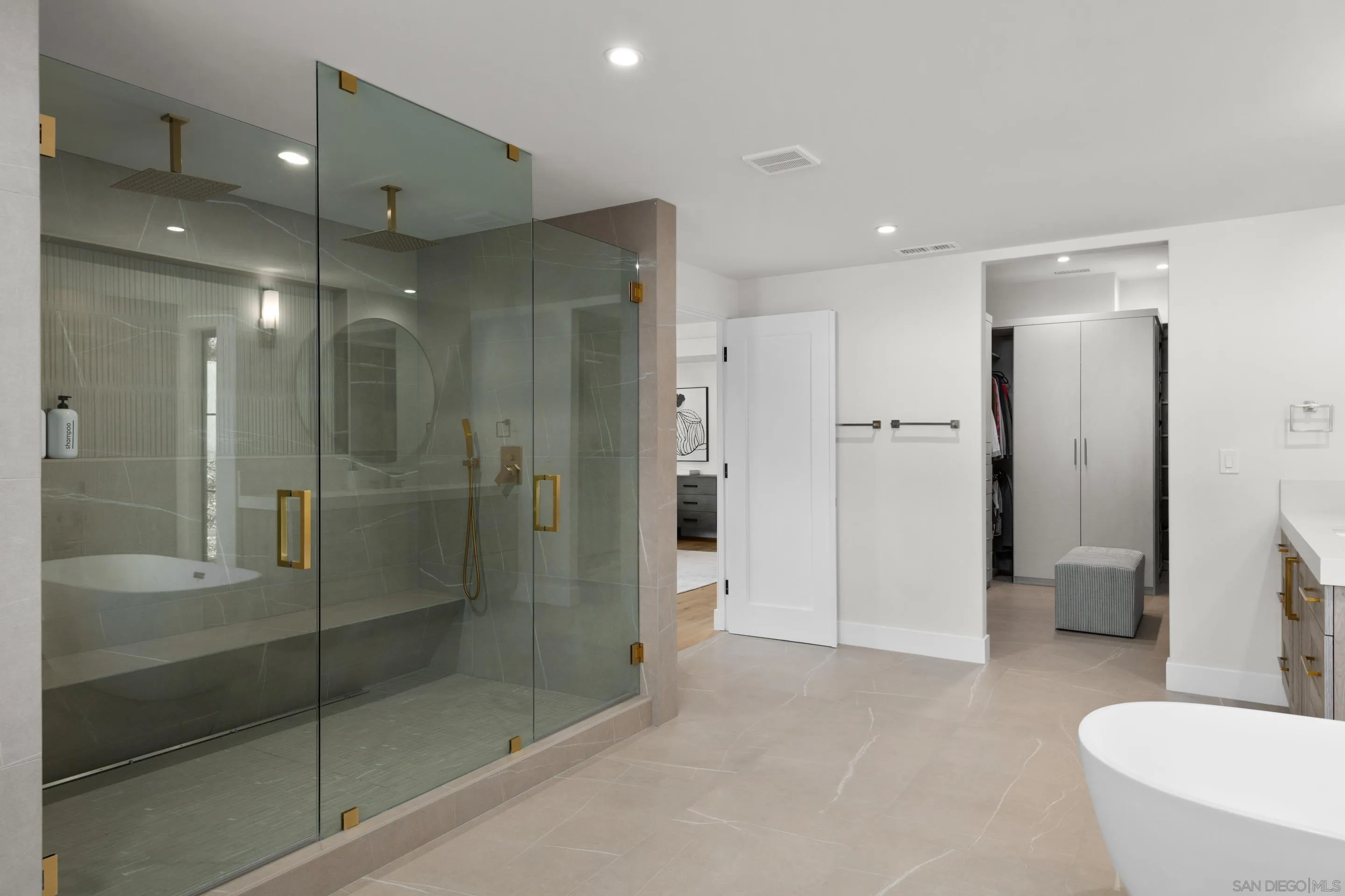 6665 Via Estrada La Jolla, CA 92037 - Photo 42 of 59 a bathroom with a shower and a sink