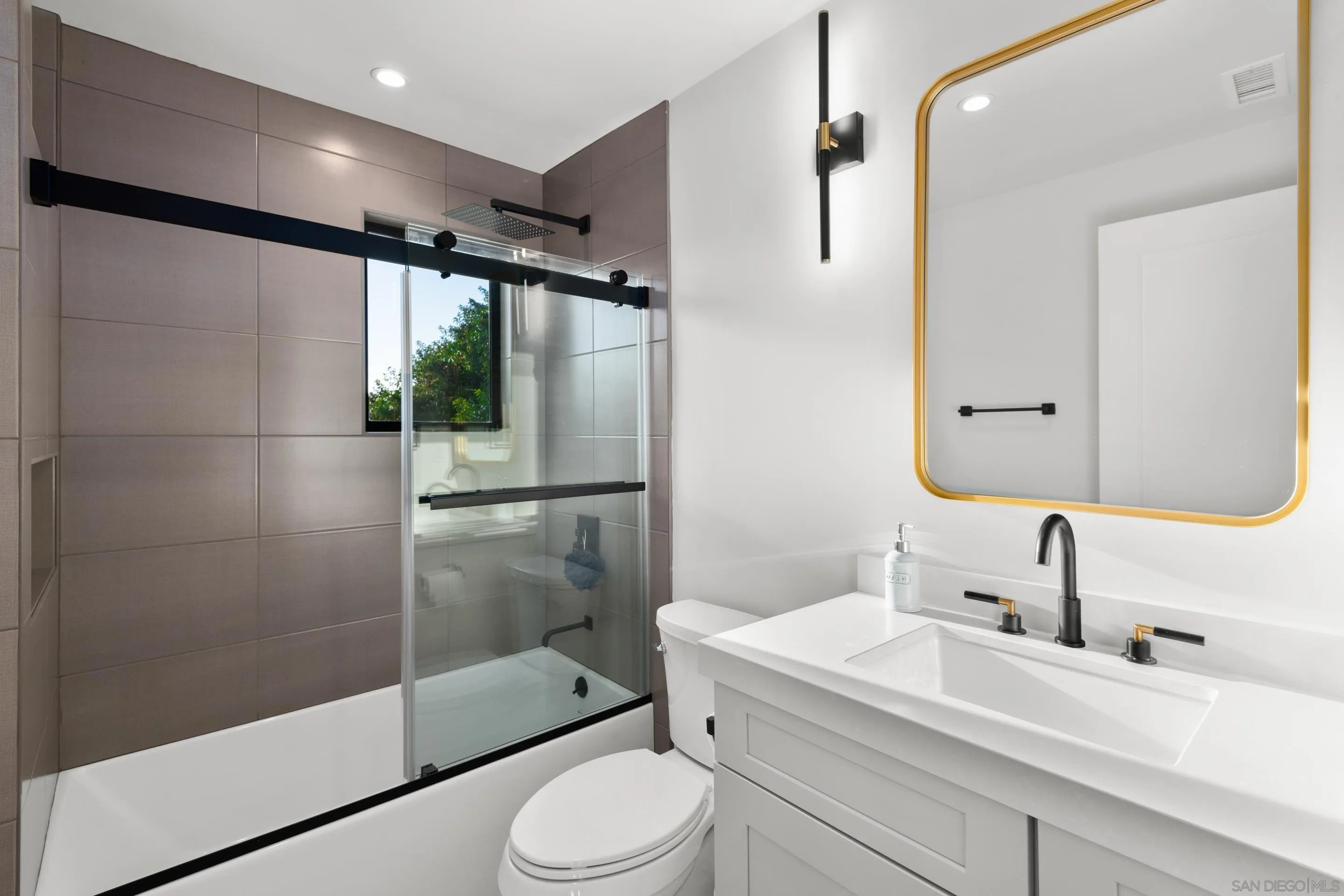 6665 Via Estrada La Jolla, CA 92037 - Photo 48 of 59 a bathroom with a sink toilet and shower