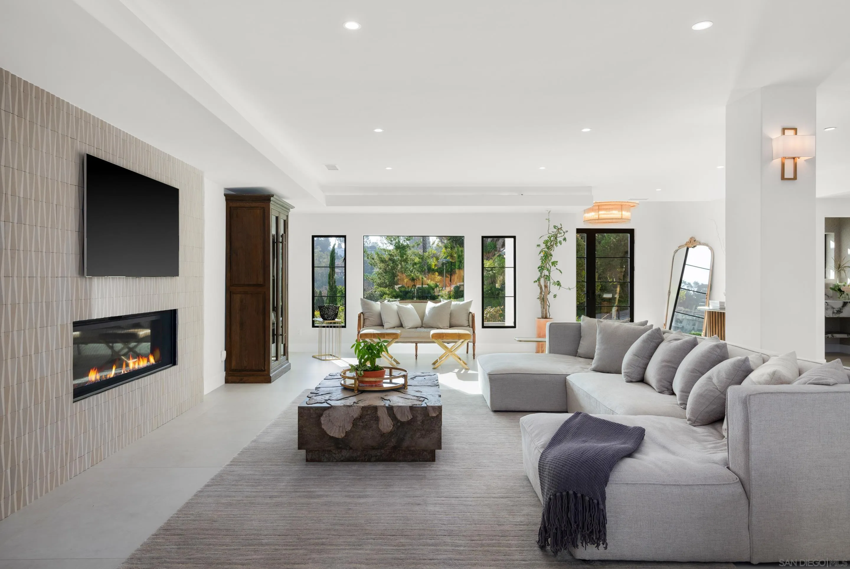 6665 Via Estrada La Jolla, CA 92037 - Photo 5 of 59 a living room with furniture and a fireplace