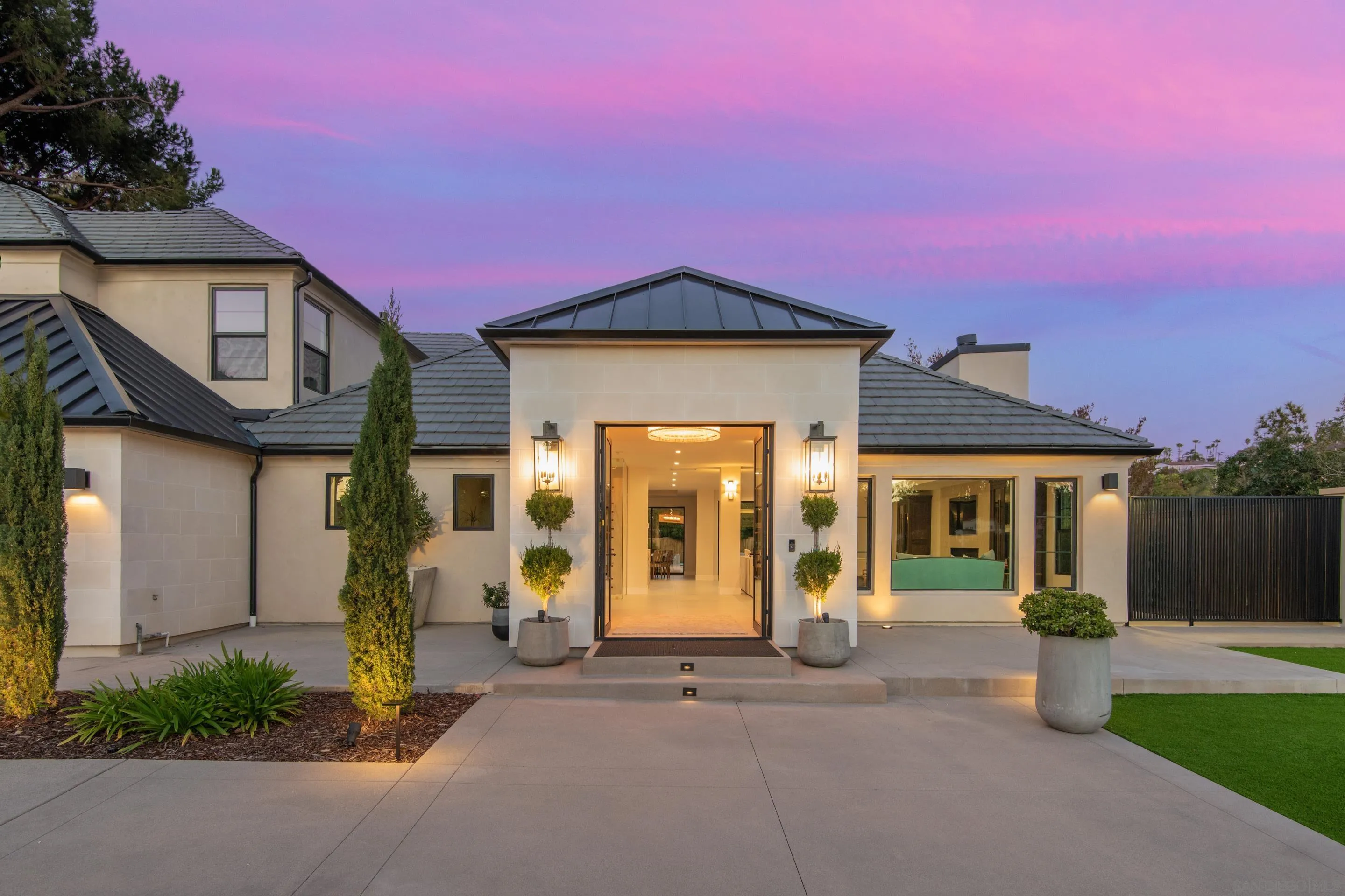 6665 Via Estrada La Jolla, CA 92037 - Photo 56 of 59 a front view of a house with a yard