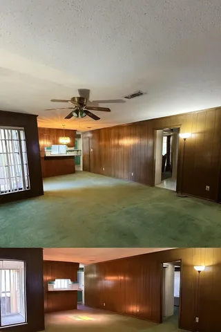 a view of an empty room and window