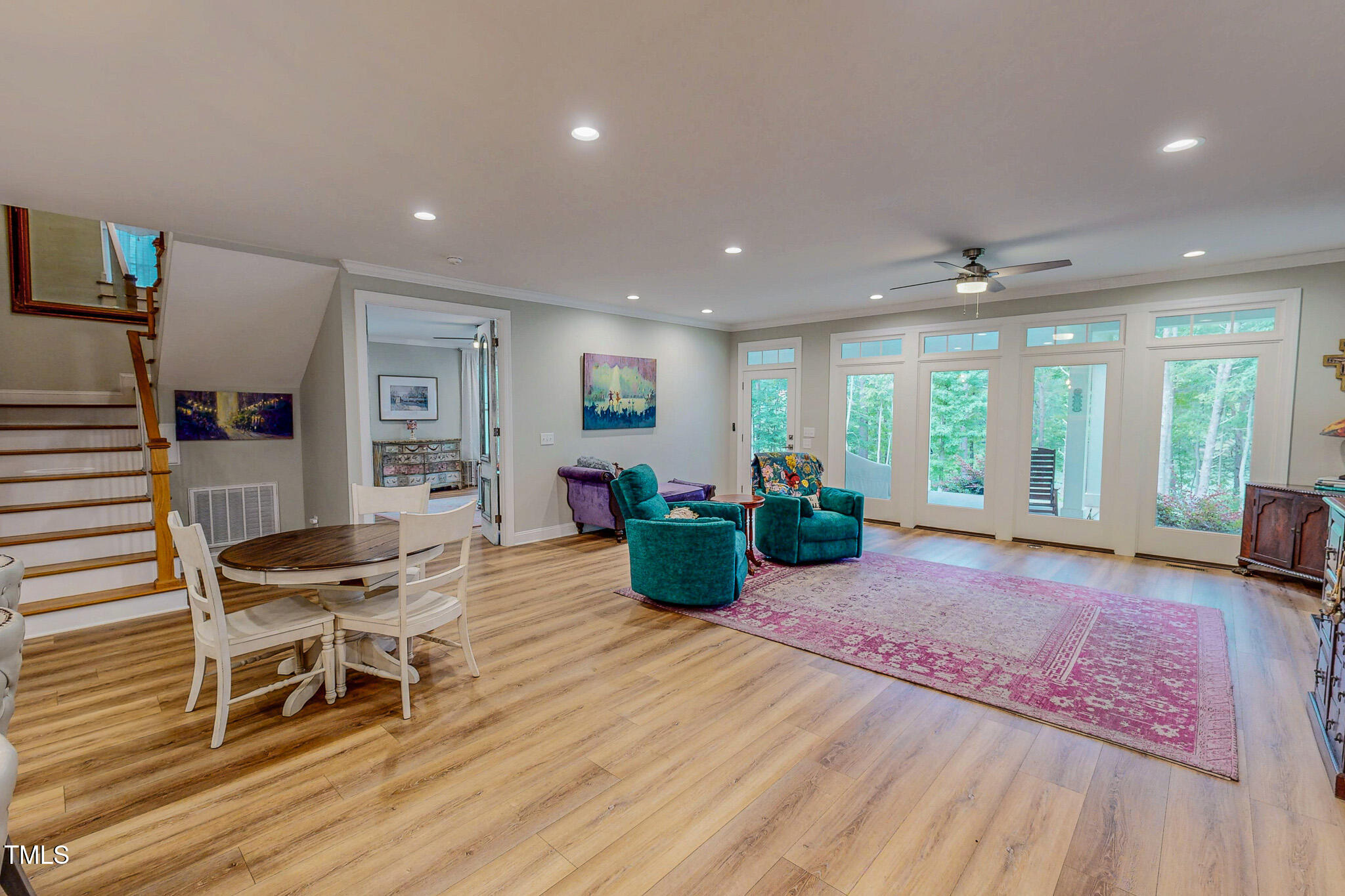 355 Fishermans Point Road Roxboro, NC 27574 - Photo 11 of 70 a living room with furniture and a wooden floor