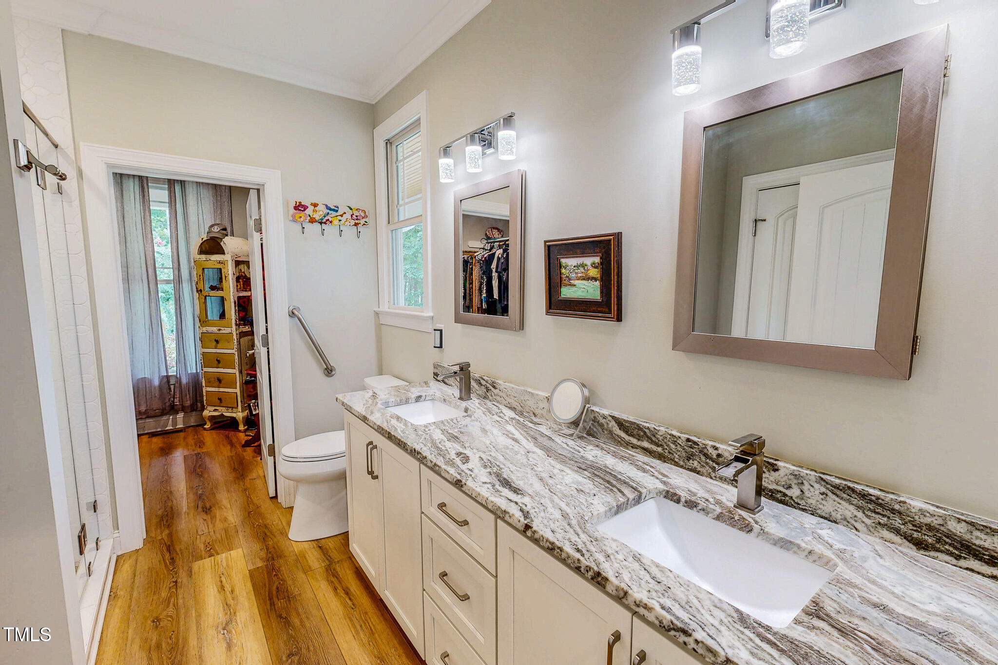 355 Fishermans Point Road Roxboro, NC 27574 - Photo 32 of 70 a bathroom with a granite countertop double vanity sink and mirror