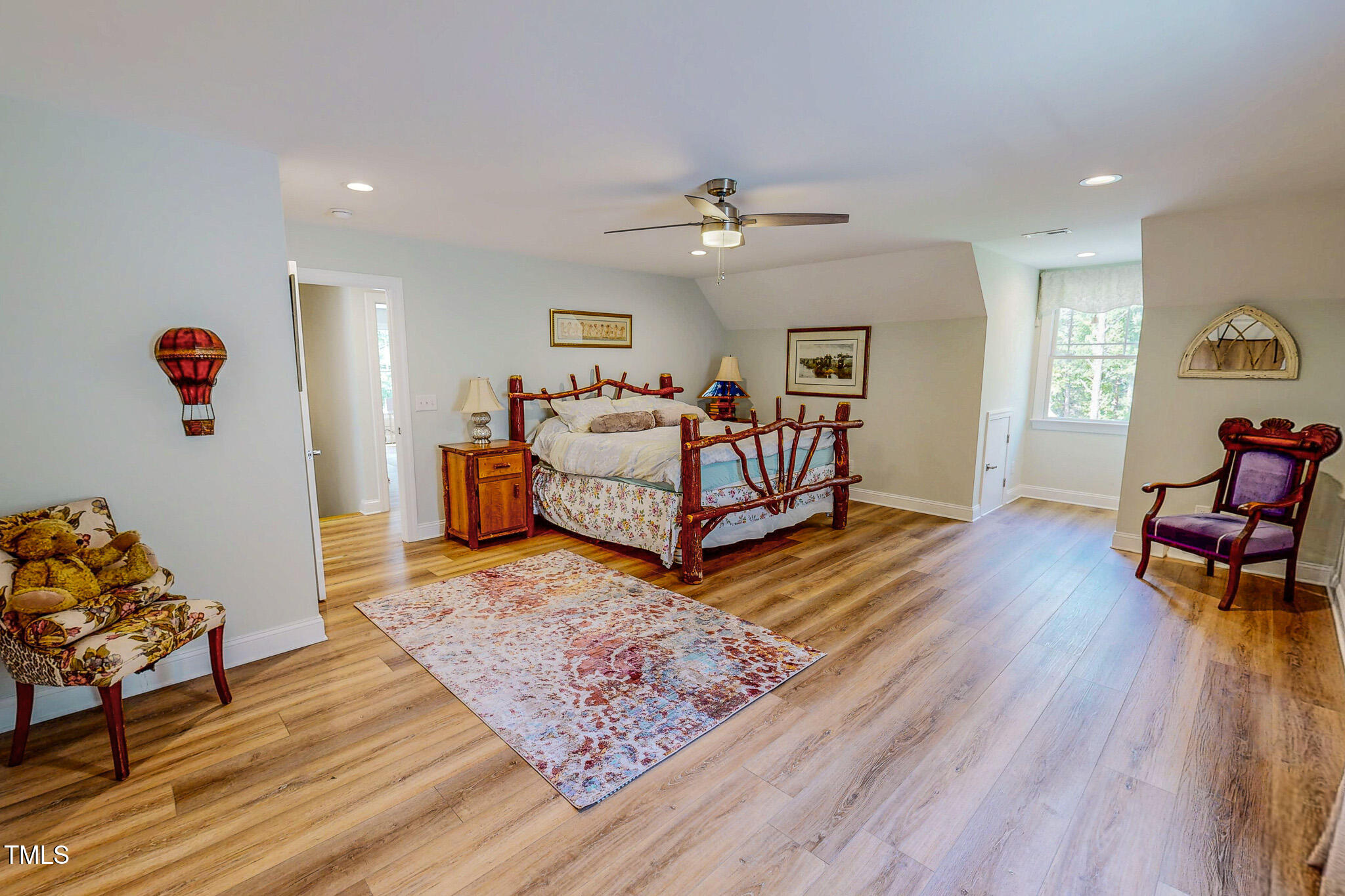 355 Fishermans Point Road Roxboro, NC 27574 - Photo 50 of 70 a living room with furniture and wooden floor