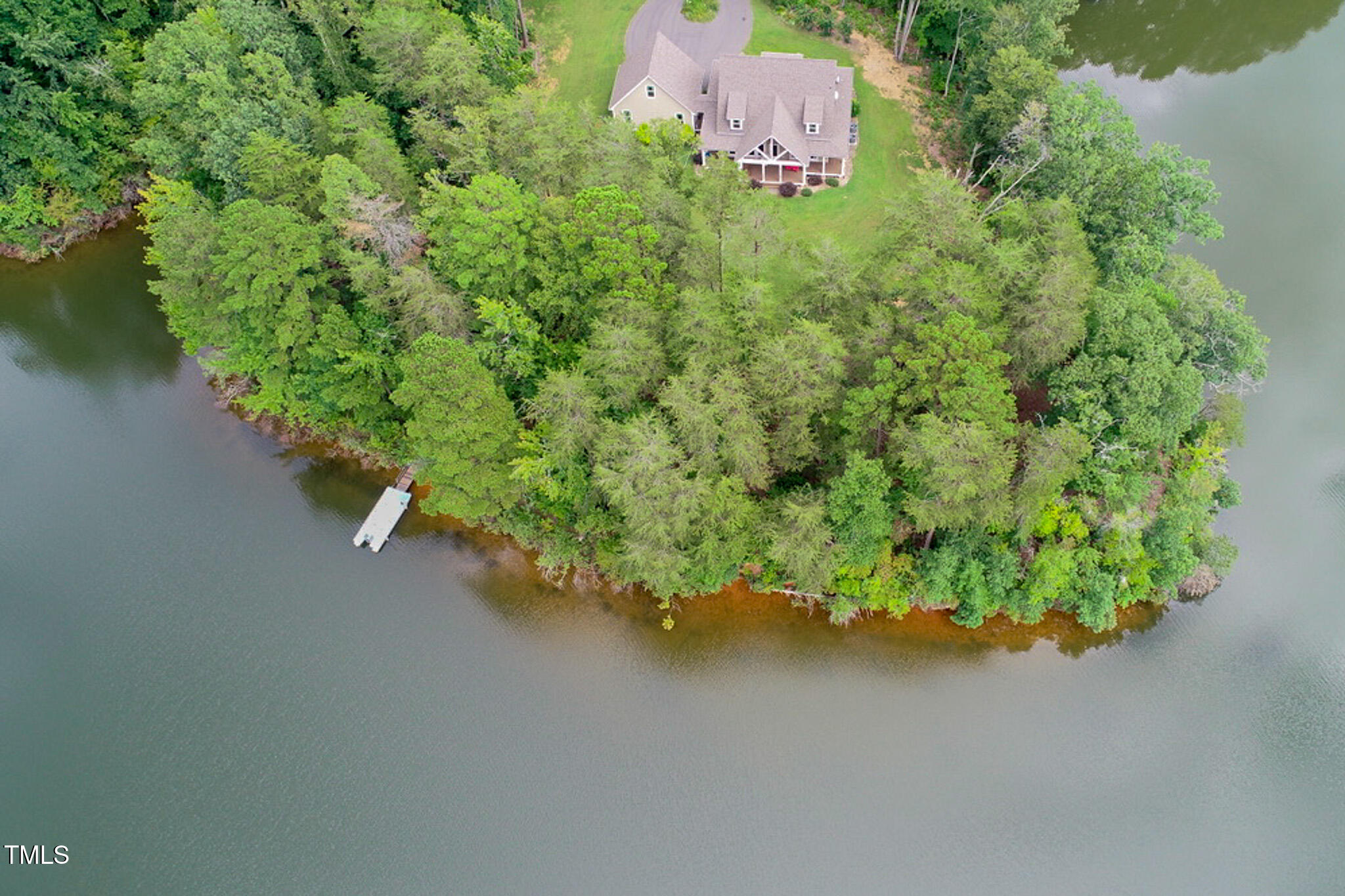 355 Fishermans Point Road Roxboro, NC 27574 - Photo 64 of 70 an aerial view of a house with a yard and lake view