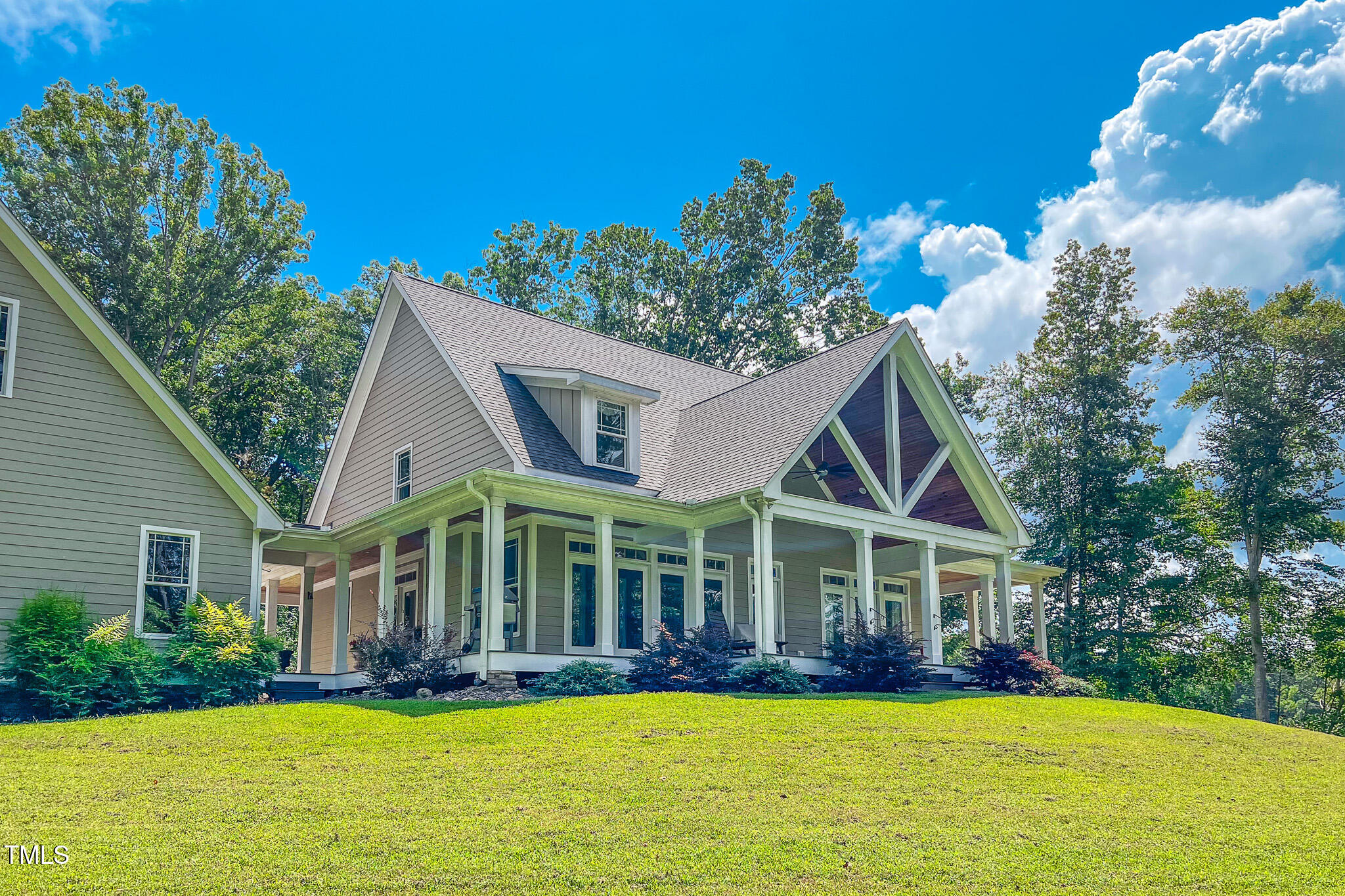 355 Fishermans Point Road Roxboro, NC 27574 - Photo 66 of 70 a view of a house with a yard