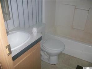 161 Sedberry Road Biscoe, NC 27209 - Photo 7 of 7 a bathroom with a sink and toilet