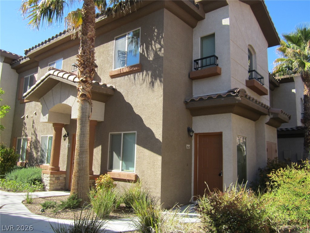 7701 West Robindale Road, Unit 262 Las Vegas, NV 89113 - Photo 3 of 26 A welcoming front entrance with distinct architectural elements awaits you.