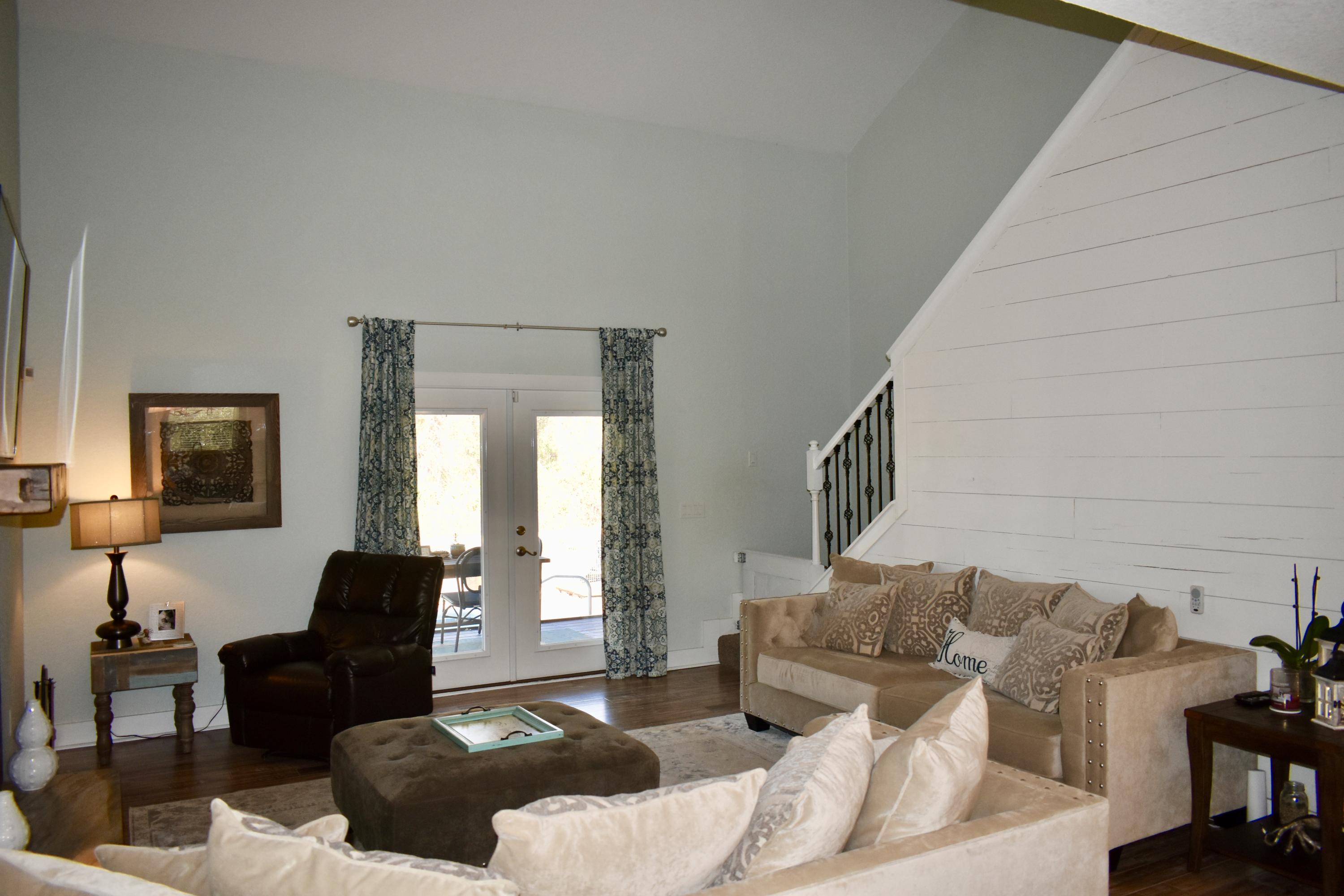 153 Spotted Dolphin Road Santa Rosa Beach, FL 32459 - Photo 15 of 36 a living room with furniture and a couch