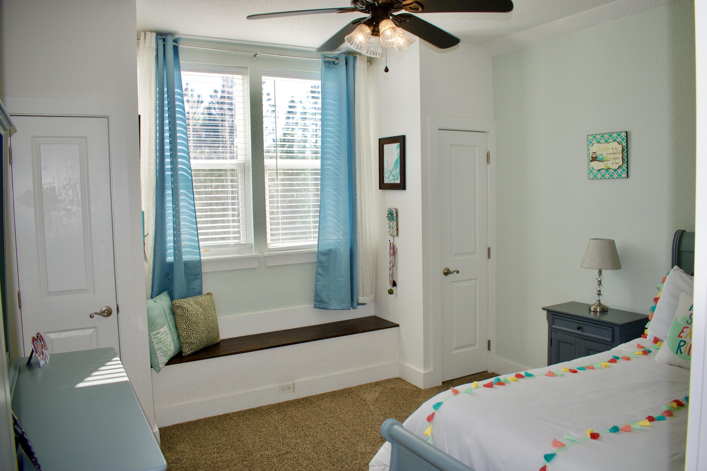 153 Spotted Dolphin Road Santa Rosa Beach, FL 32459 - Photo 28 of 36 a bedroom with a bed and a window