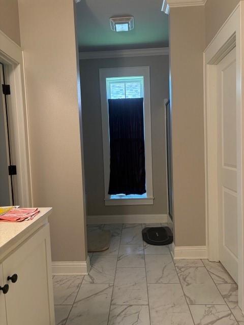 6896 Bethany Reed Circle Blanchard, LA 71107 - Photo 7 of 9 Bathroom featuring marble-look tile flooring, white baseboards, and a tall window with white trim