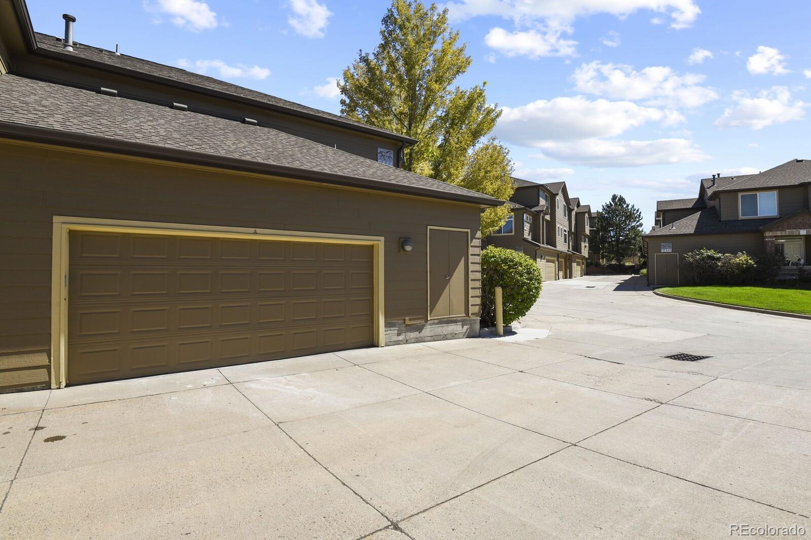 6444 Silver Mesa Drive, Unit A Highlands Ranch, CO 80130 - Photo 22 of 40 a side view of a house