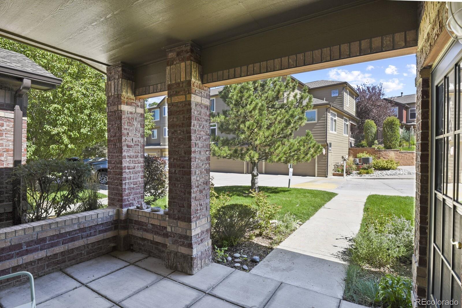 6444 Silver Mesa Drive, Unit A Highlands Ranch, CO 80130 - Photo 3 of 40 a view of backyard with garden