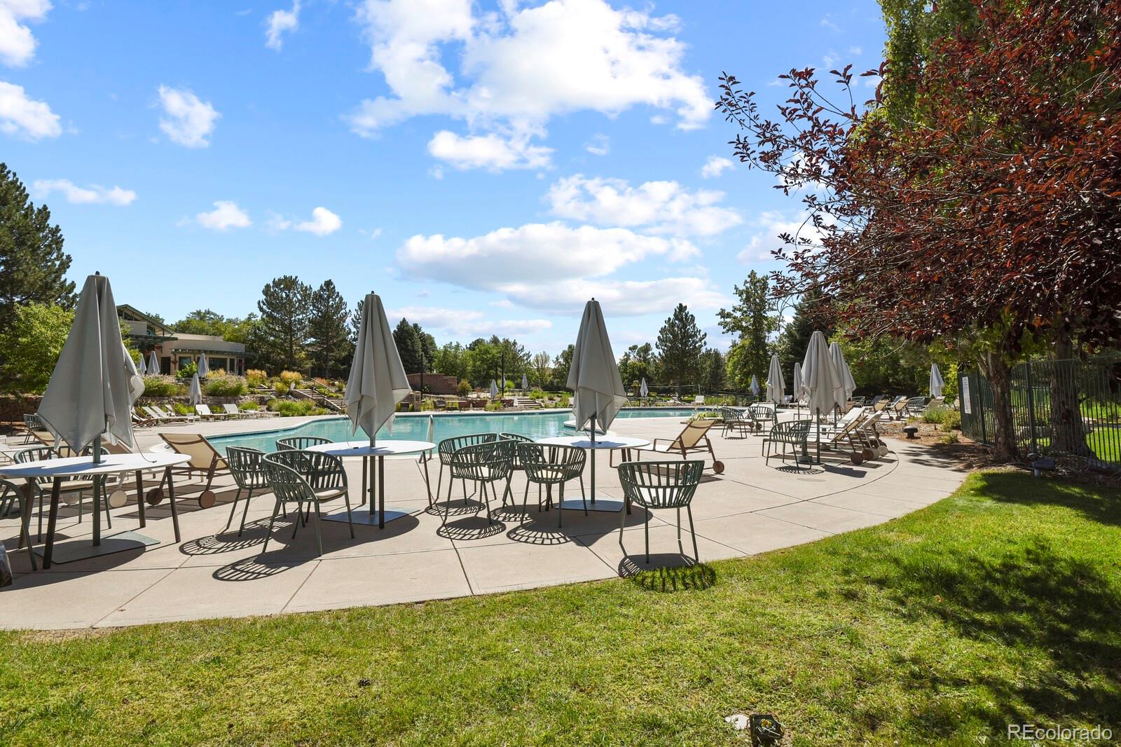 6444 Silver Mesa Drive, Unit A Highlands Ranch, CO 80130 - Photo 35 of 40 a view of a patio with chairs and table