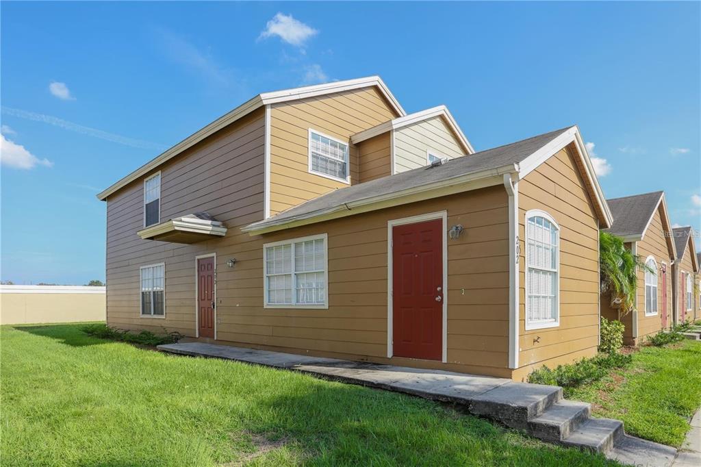 a front view of house with yard