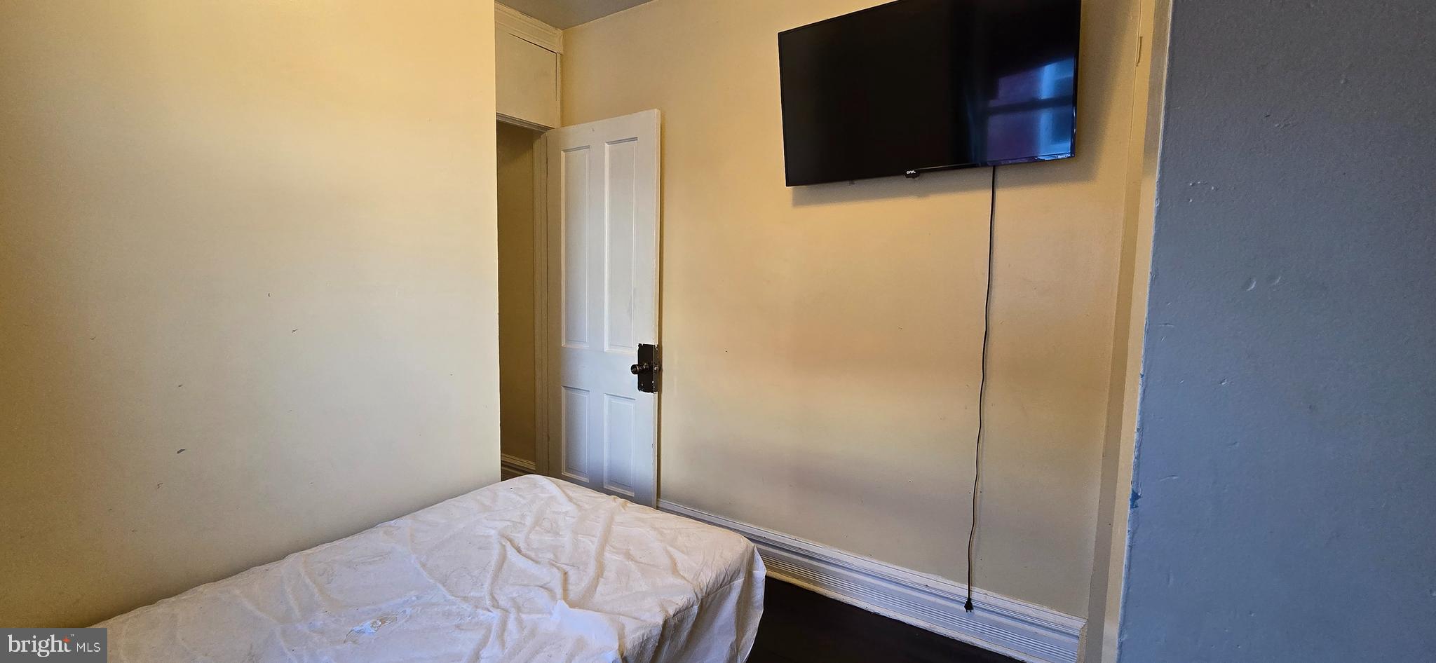 610 South Prince Street Lancaster, PA 17603 - Photo 35 of 52 a bedroom with a bed and a flat screen tv