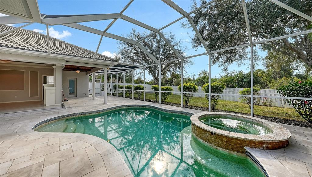 12202 Lobelia Terrace Lakewood Ranch, FL 34202 - Photo 75 of 80 a view of a swimming pool with a patio