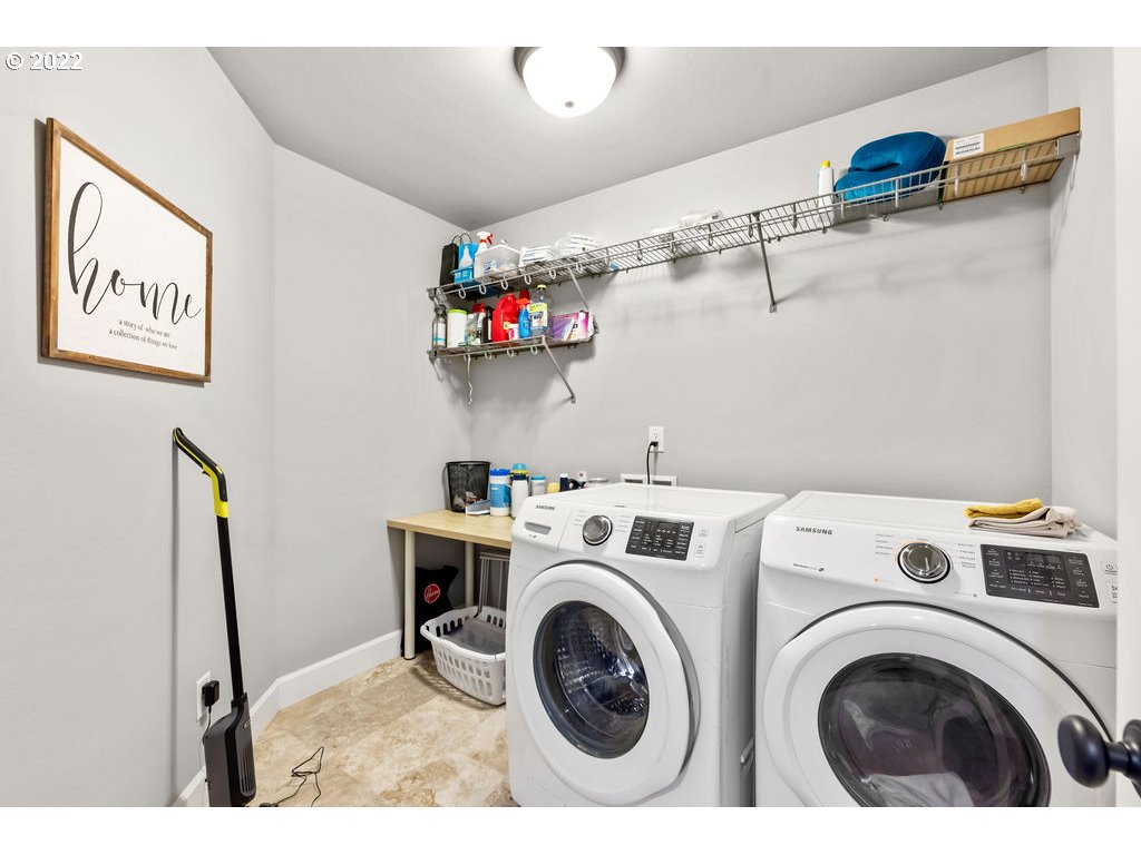 4593 North Noble Loop Ridgefield, WA 98642 - Photo 14 of 22 a utility room with dryer and washer