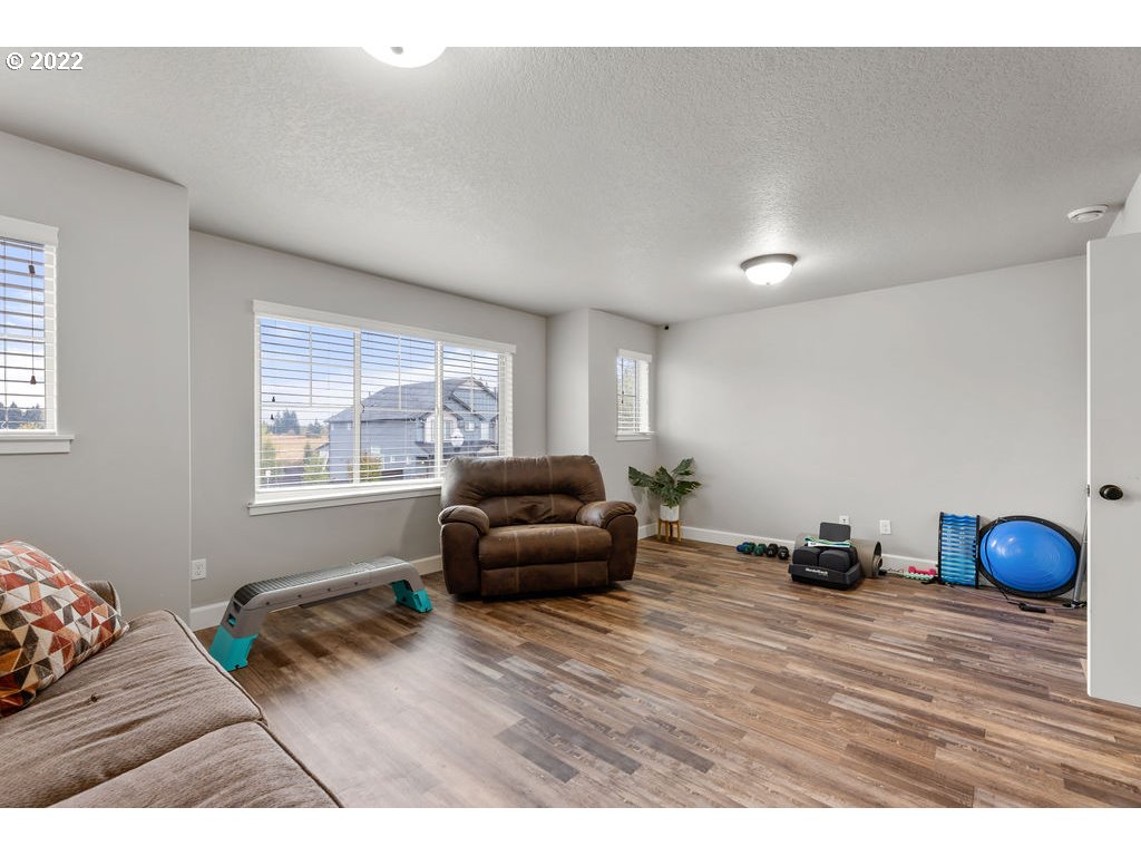 4593 North Noble Loop Ridgefield, WA 98642 - Photo 20 of 22 a living room with furniture and a window