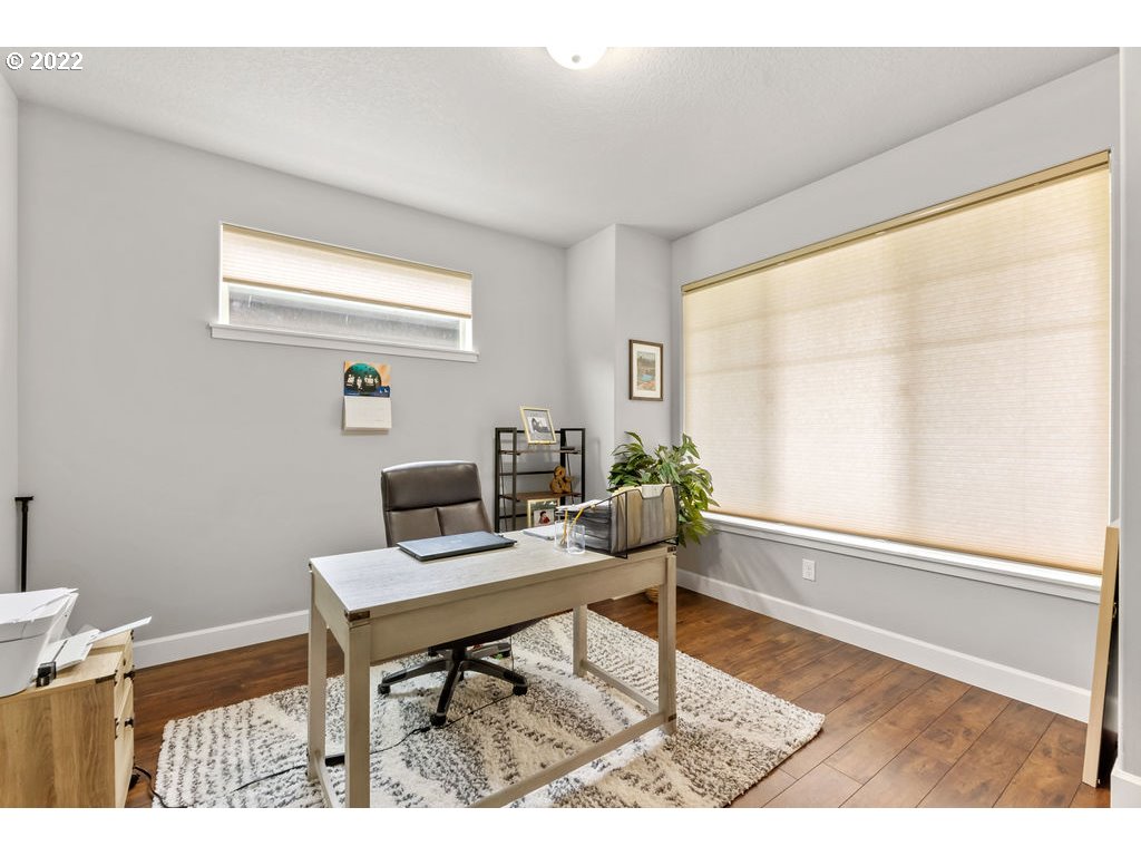 4593 North Noble Loop Ridgefield, WA 98642 - Photo 2 of 22 a workspace with furniture and a window