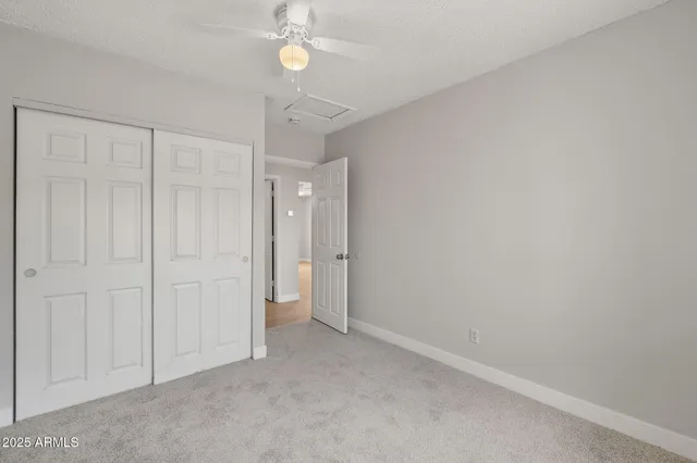 an empty room with a bathroom