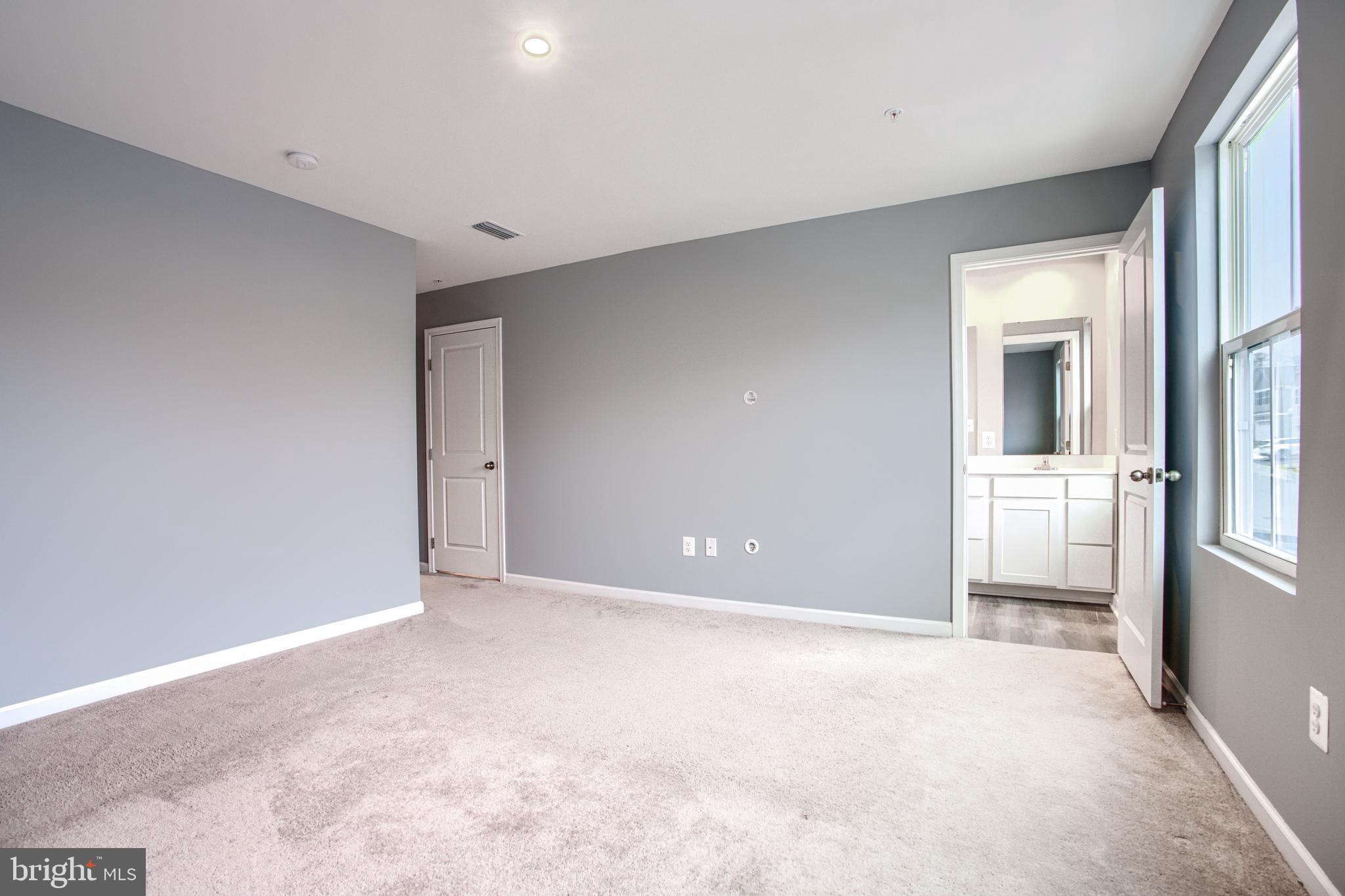 104 Magnolia Drive Elkton, MD 21921 - Photo 19 of 52 a view of a big room with closet and windows