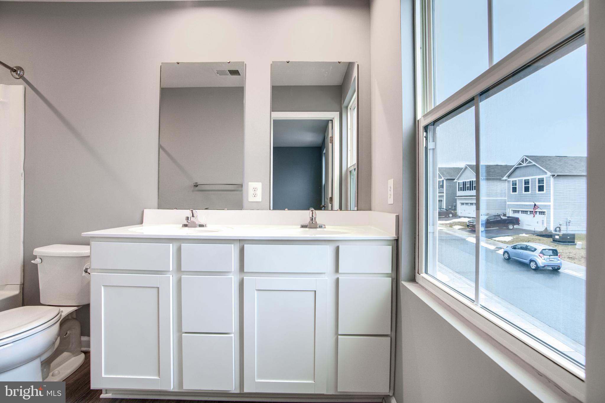 104 Magnolia Drive Elkton, MD 21921 - Photo 21 of 52 a bathroom with a sink and a toilet