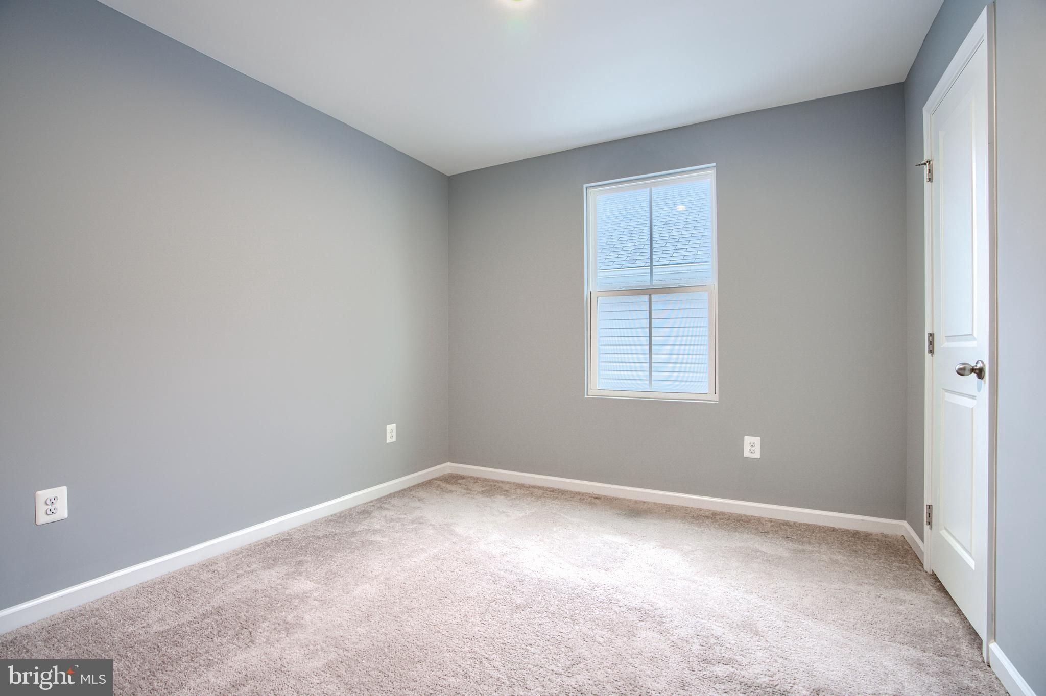 104 Magnolia Drive Elkton, MD 21921 - Photo 25 of 52 an empty room with windows
