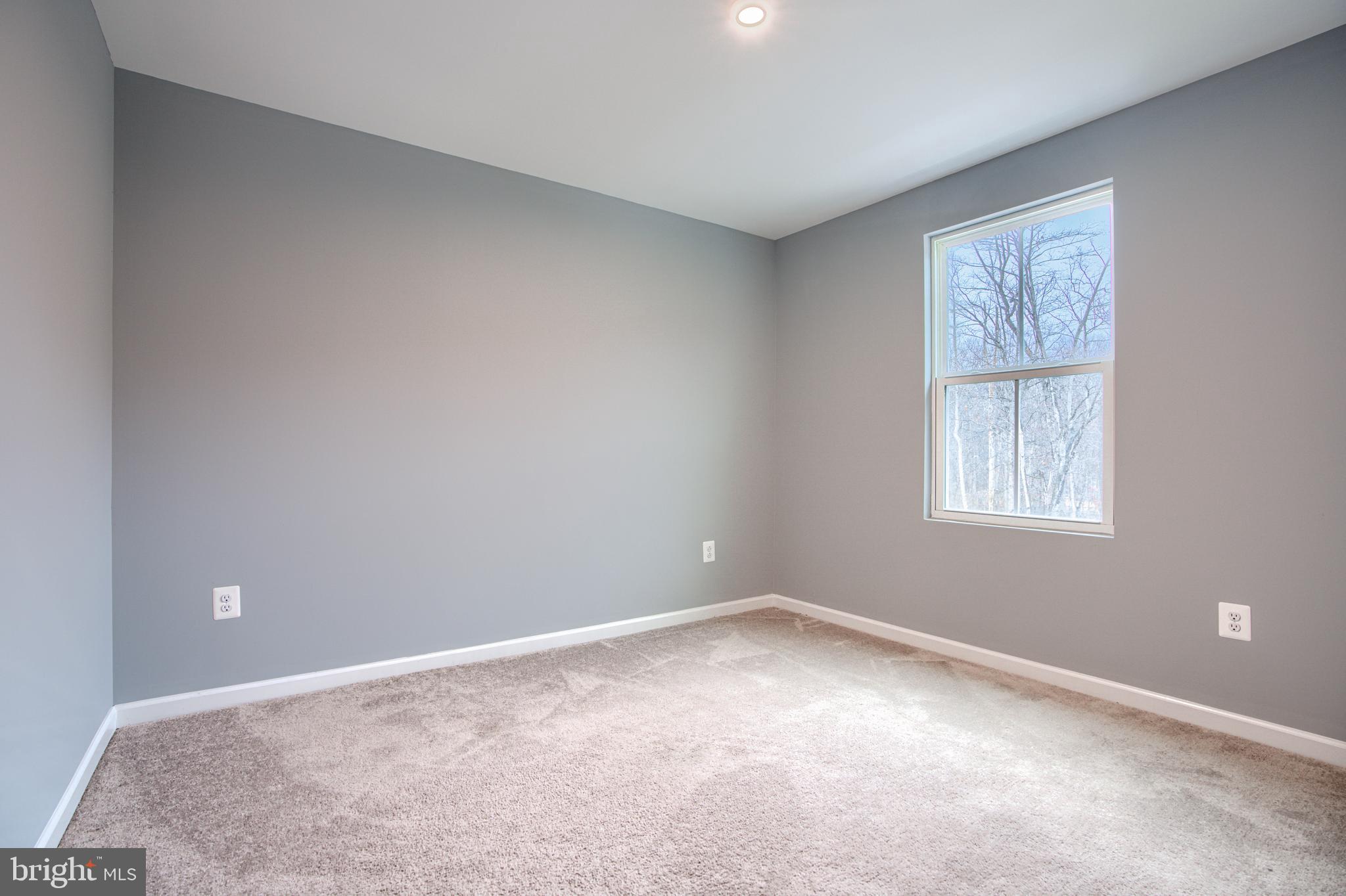 104 Magnolia Drive Elkton, MD 21921 - Photo 29 of 52 a view of an empty room with a window