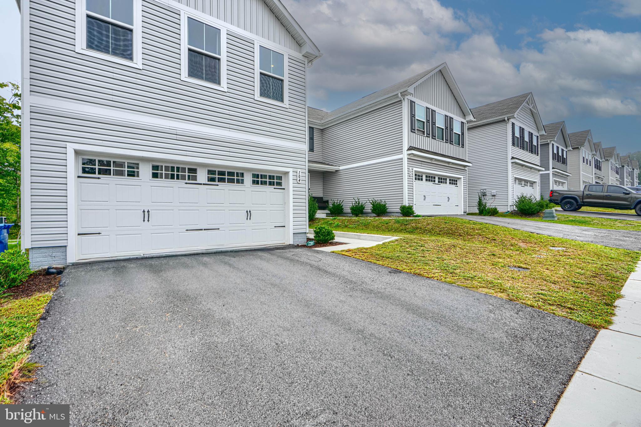 104 Magnolia Drive Elkton, MD 21921 - Photo 3 of 52 a view of a house with backyard and a garage
