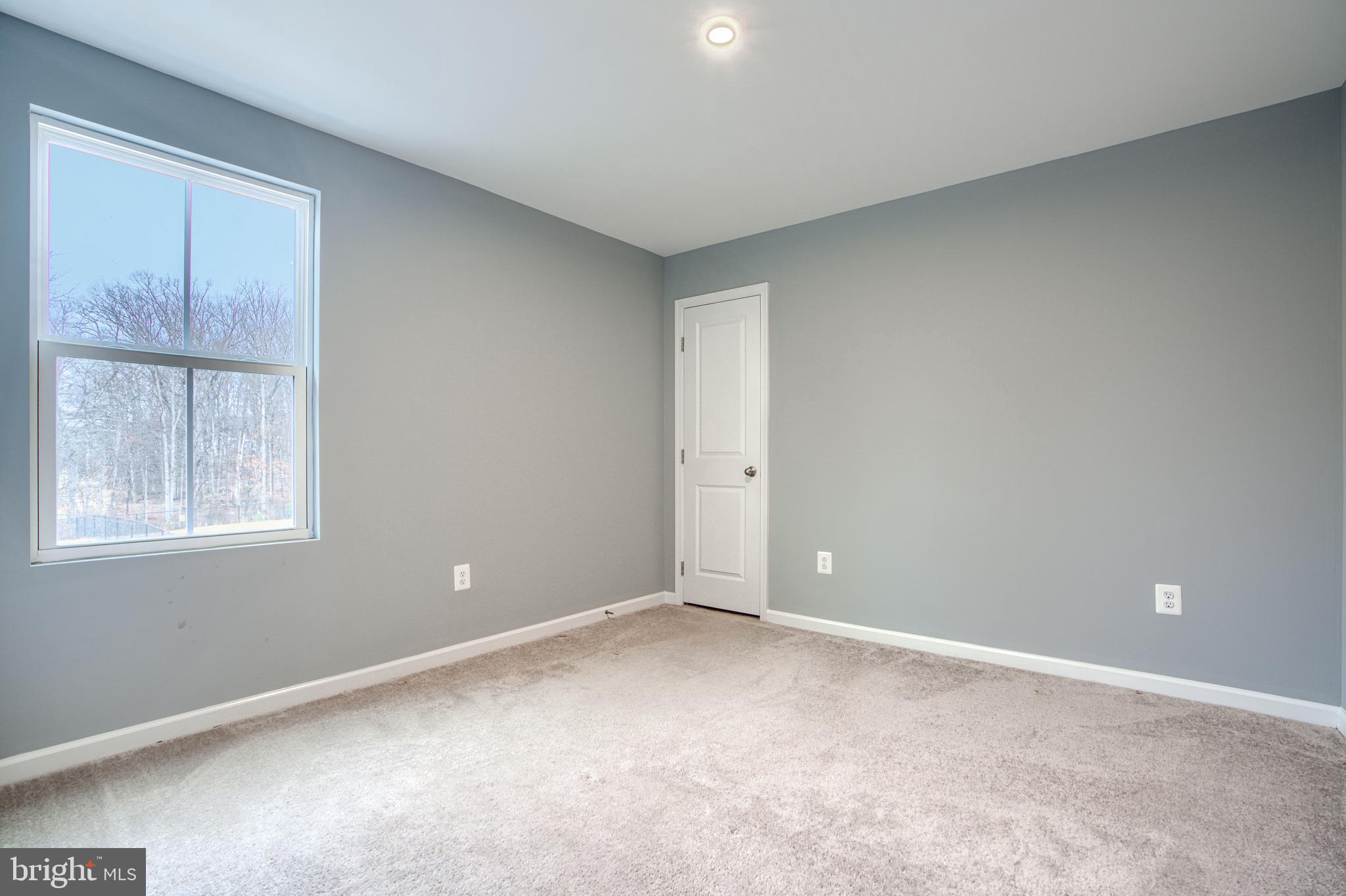 104 Magnolia Drive Elkton, MD 21921 - Photo 33 of 52 a view of an empty room with a window